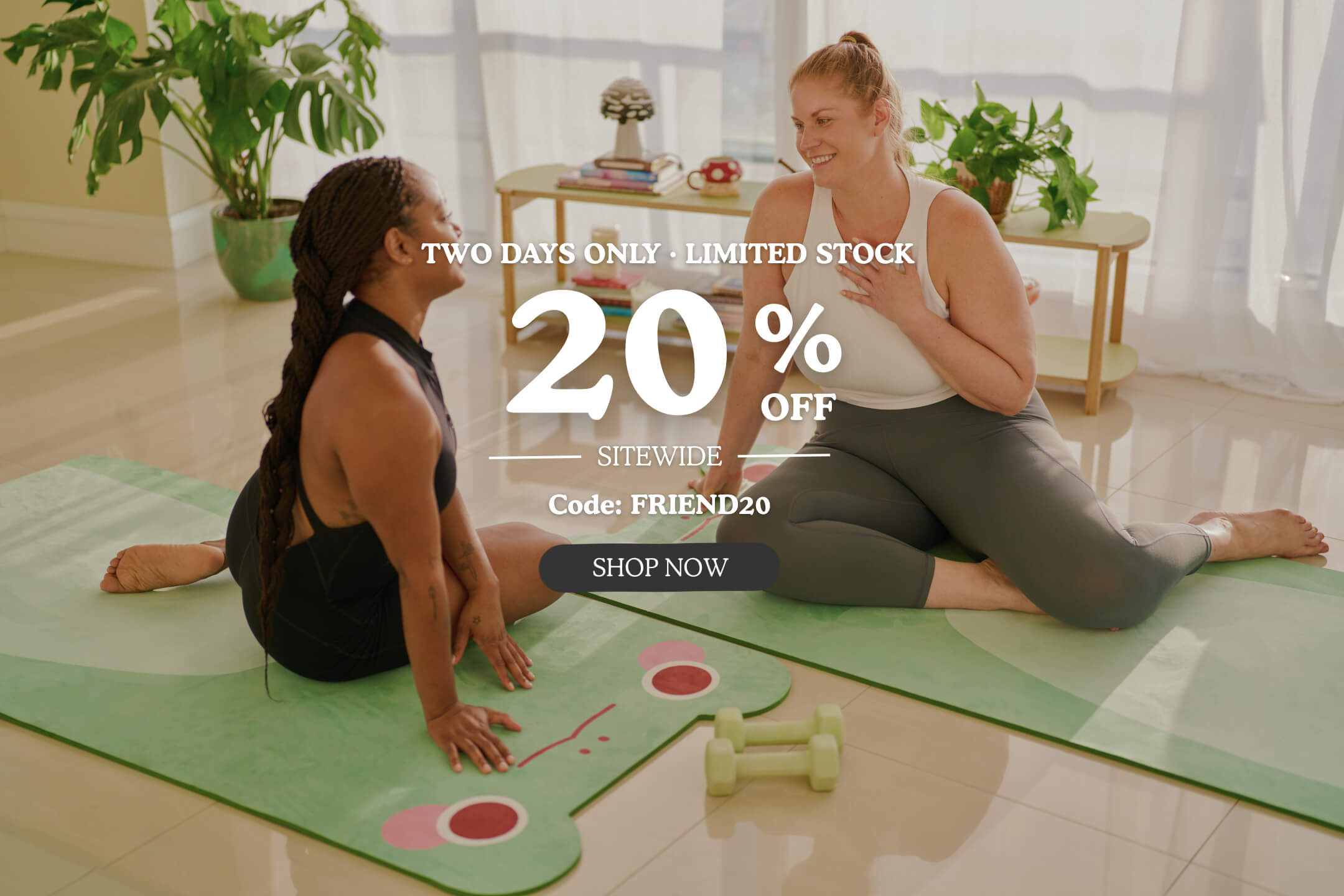 Two women stretching on Tiny Protectors green yoga mats during workout, code FRIEND20 for sitewide sale